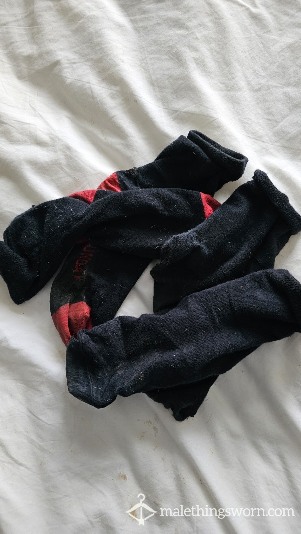 2 Pairs Of Worn Out Stinky Socks.