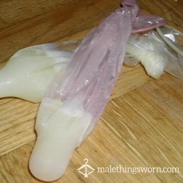 2 Used Condoms With Our Full Loads