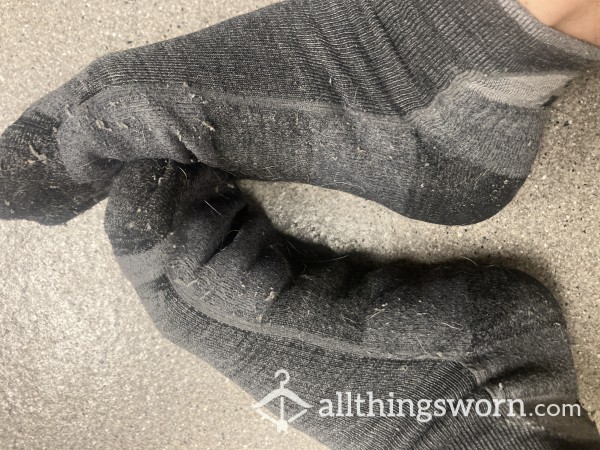 Well-Worn Darn Tough Socks From Work And Play