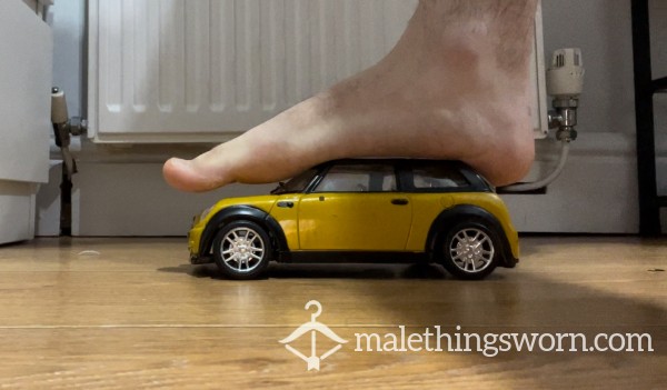 Barefoot Crushing Mini Cooper Car