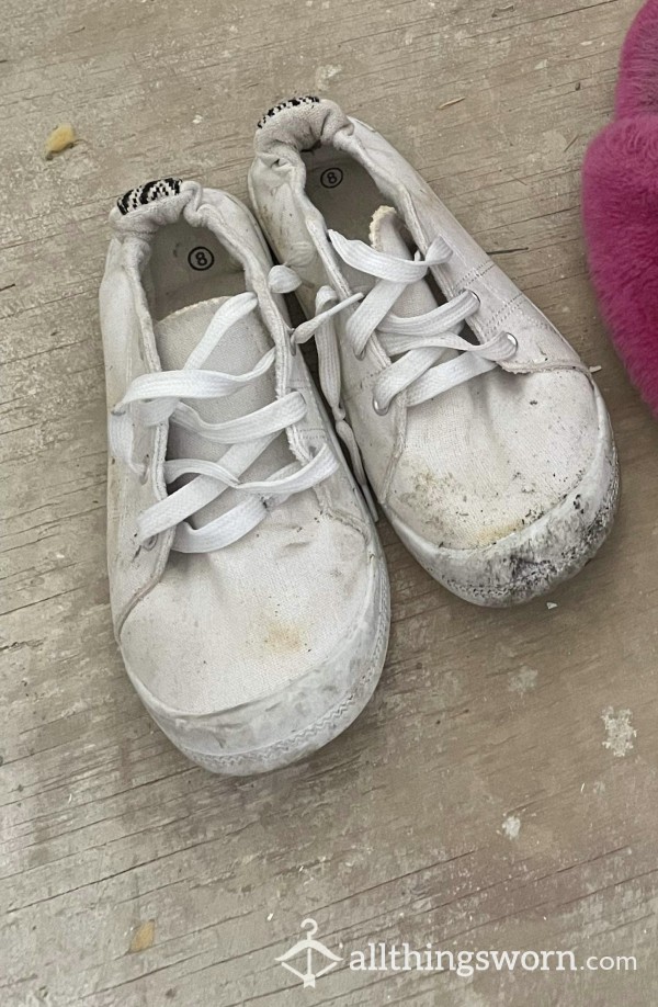 Carelessly Worn And Abused Sneakers