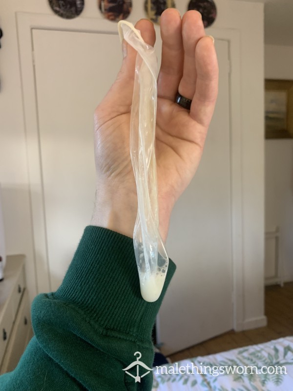 Photos Of A Condom Filled With My Cum Hanging Off My Cock