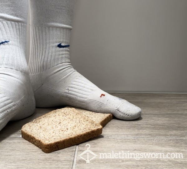 Crushing, Trampling Bread In Soccer Socks