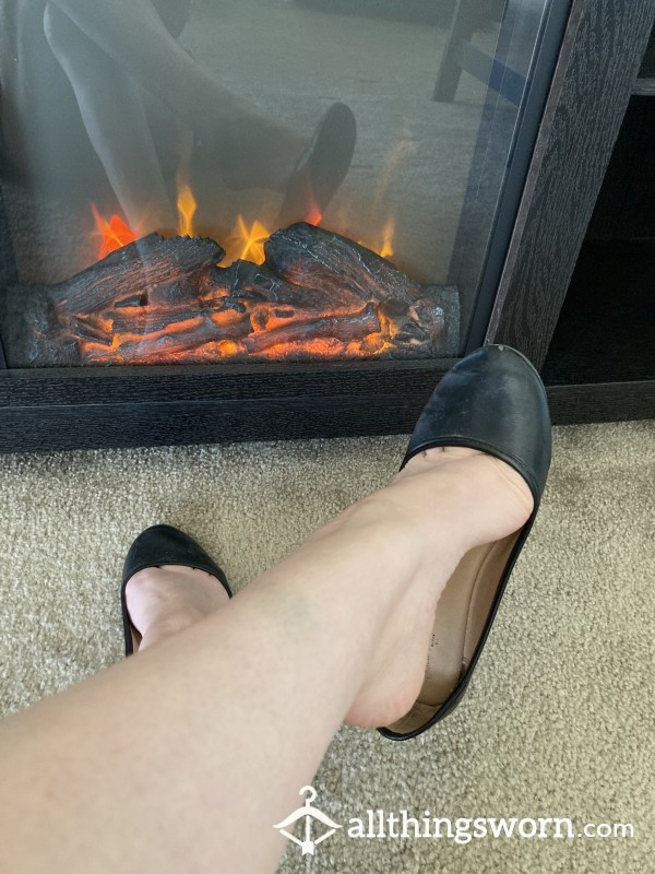 Feet Dangling In Little Black Flats With Bare Sexy Legs