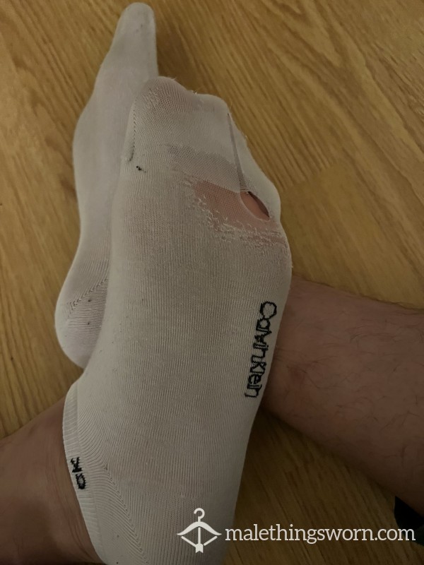 Well Worn White CK Socks With Hole