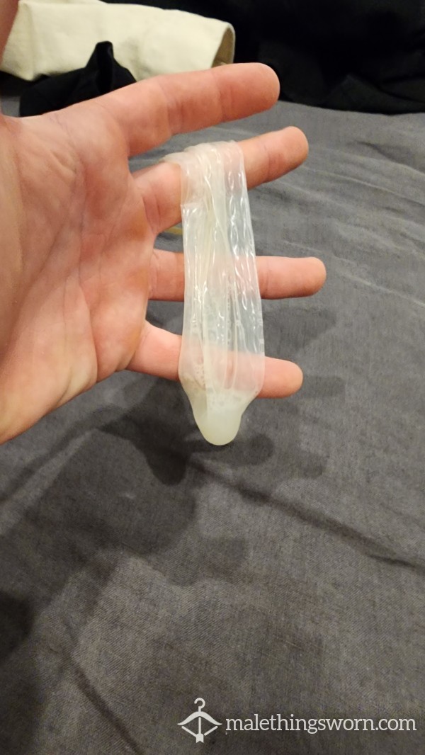 Juicy Condom Filled With A Huge Twink Load