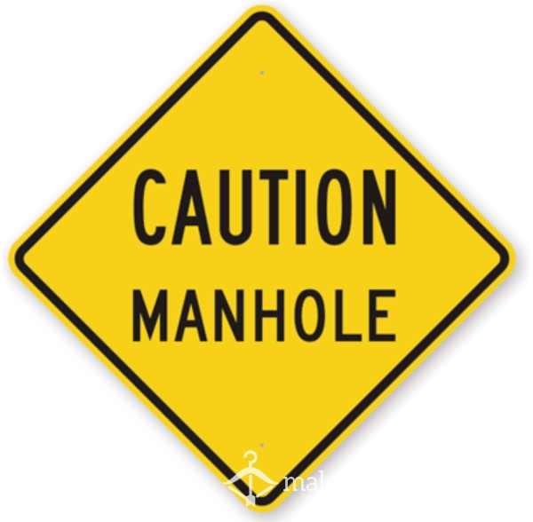Exposed Manhole (Close-Up Photo)