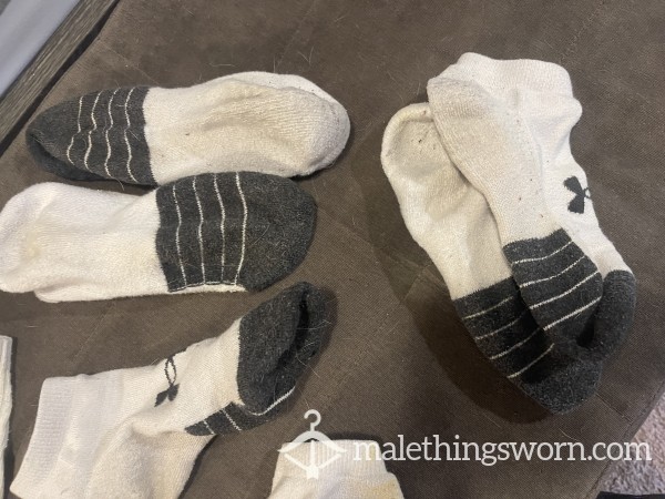 Multiple Pairs Of Well Used UA Socks