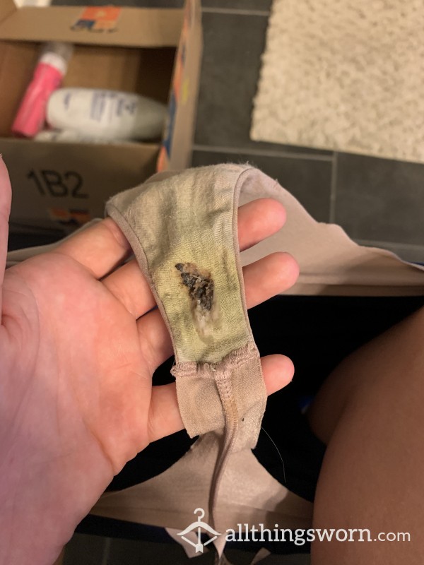 Nude Thong With Brown Discharge