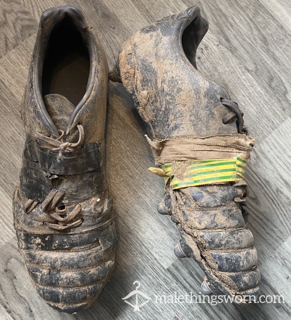 Old Worn Out Dirty Rugby Boots photo