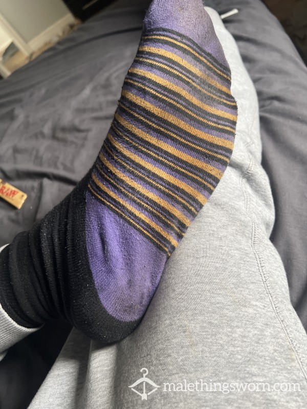 Stinking Socks Stretched Over Size 14 Feet.
