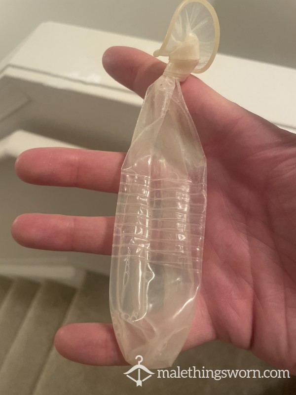Used Condom Filled With Cum