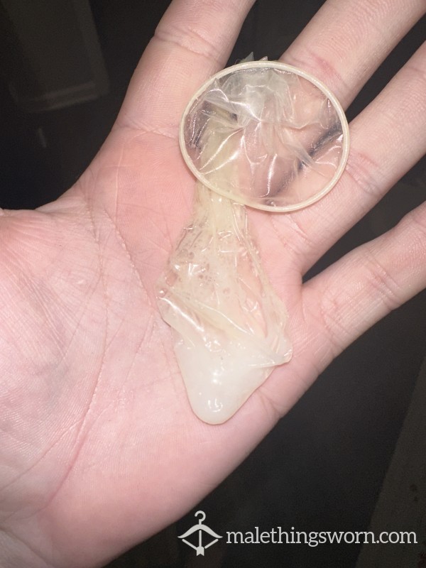 Used Trojan Condom With A Fat Load Of Cum