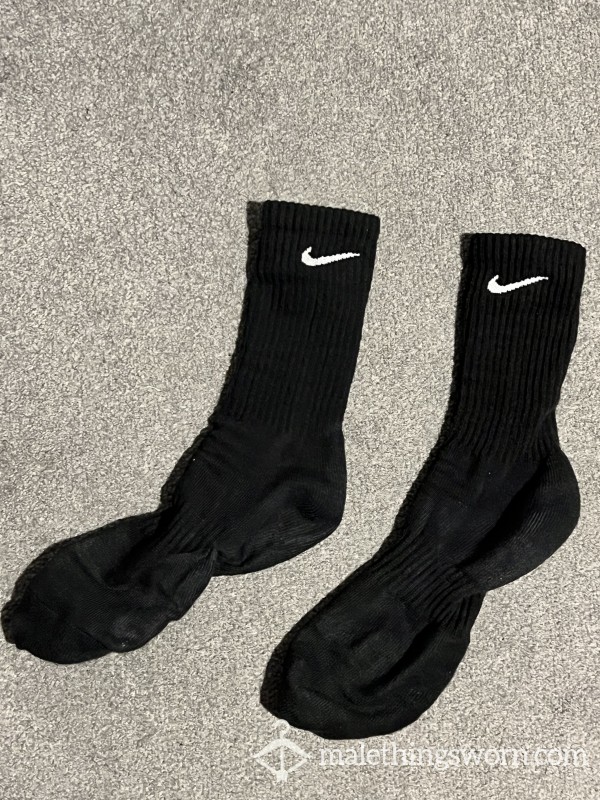 Used well worn men’s Nike black crew todays work & gym socks photo