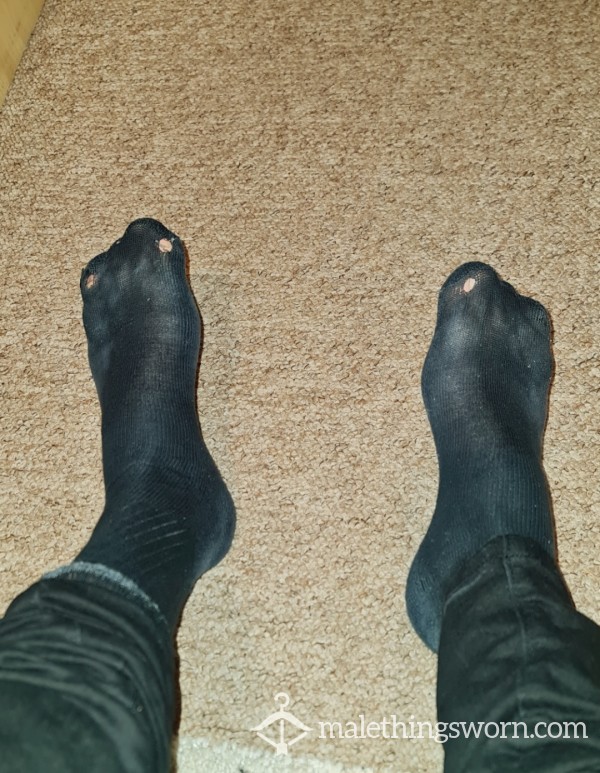 Very Used And Well-worn Black Socks