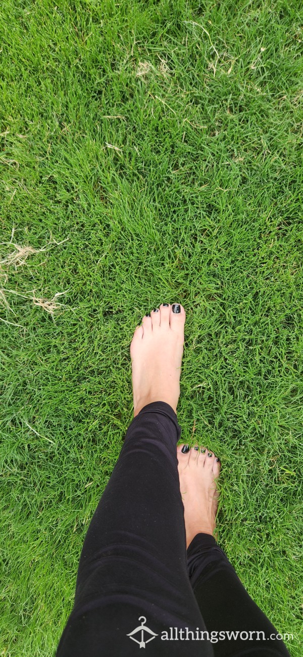 Walking Barefoot On Grass And Rocks