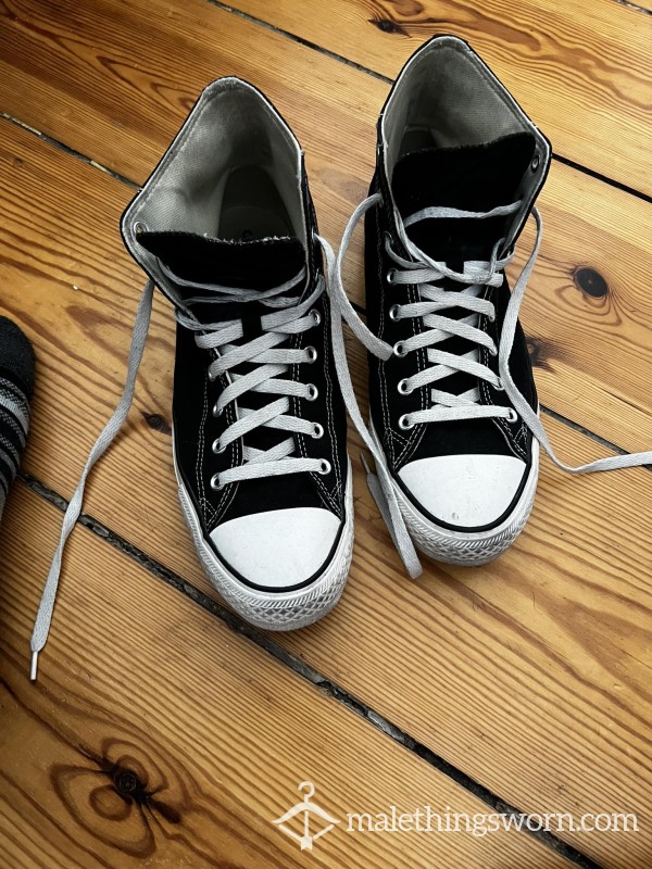 Well-worn Black Converse Gym Shoes