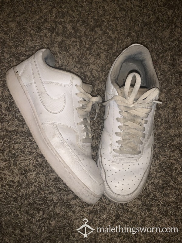 Well-worn White Nikes (gym Shoes)