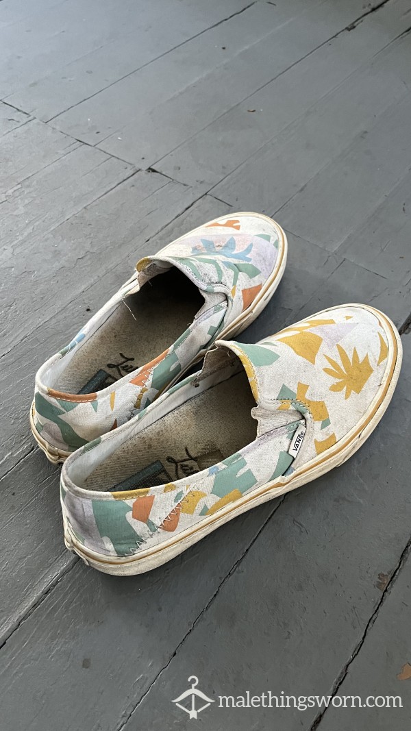 Worn, Dirty Slip-On Vans Used For Hard Labor And Gardening photo